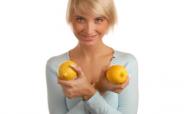 blonde girl holding lemons