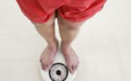 man standing on scales man standing on scales
