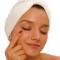 woman applying eye cream woman applying eye cream