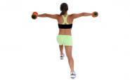 woman doing lunge with weights