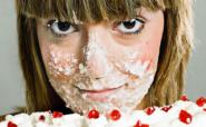 woman eating cream cake