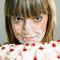 woman eating cream cake