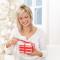 woman unwrapping Christmas gift