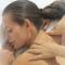 girl getting a shoulder massage