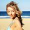 Woman on beach with summer hair look